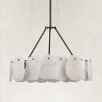 Unlit black round petal chandelier.