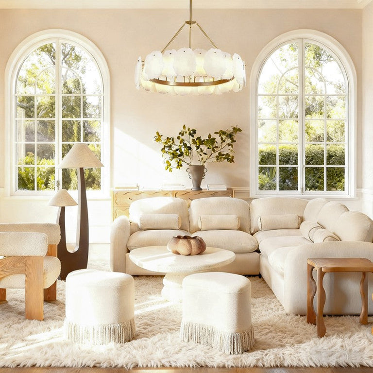 Petal Round LED Chandelier, 32 in in brass finish, shown in a living room
