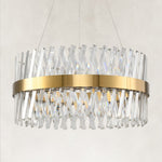 Brass round chandelier with crossing clear K9 crystal prisms
