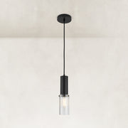 Matte-black ribbed glass cylinder mini pendant shown as a complete fixture