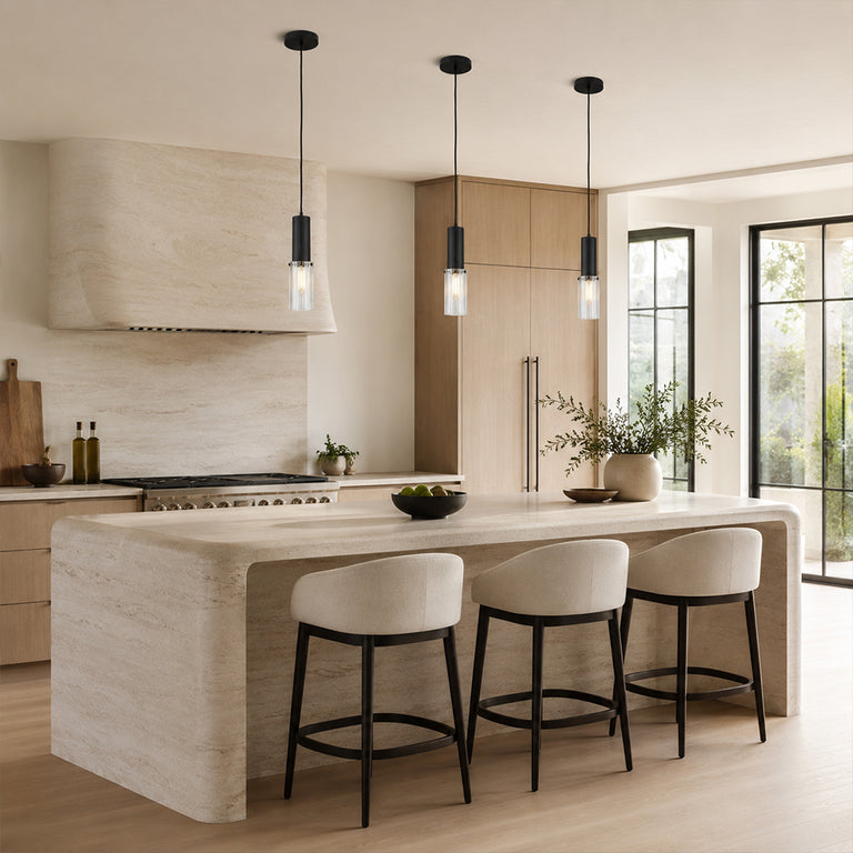 Matte-black ribbed glass mini pendant above a kitchen counter