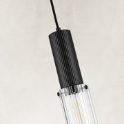 Ribbed clear glass detail on the matte-black mini pendant