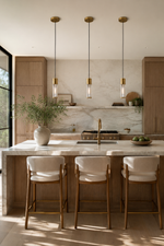 Vertical kitchen scene with the brass ringed ribbed glass mini pendant
