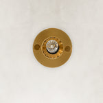 Underside detail of the brass ringed ribbed glass mini pendant