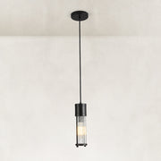 Matte-black ringed ribbed glass mini pendant shown as a complete fixture