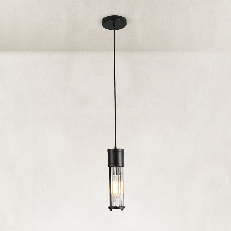 Matte-black ringed ribbed glass mini pendant shown as a complete fixture