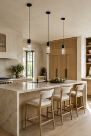 Vertical kitchen scene with the matte-black ringed ribbed glass mini pendant