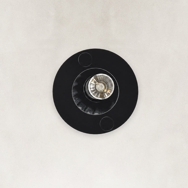 Underside detail of the matte-black ringed ribbed glass mini pendant