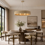 Neutral slatted ring chandelier, 31-inch round table dining room.