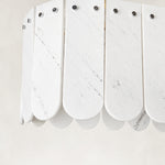 Product detail of Scalloped Marble Linear Pendant against a neutral background