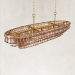 Linear amber glass chandelier detail.