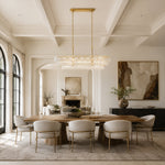 Linear clear glass chandelier room scene.