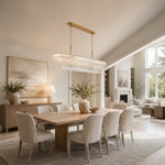 Linear clear glass chandelier room scene.