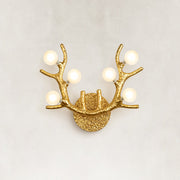 Sculptural Antler Globe Wall Sconce - complete fixture, illuminated