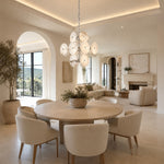 Sculptural Marble Disc Chandelier 16.1" installed above a dining table