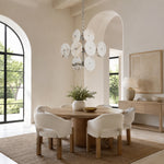 Sculptural Marble Disc Chandelier 16.1" installed above a dining table