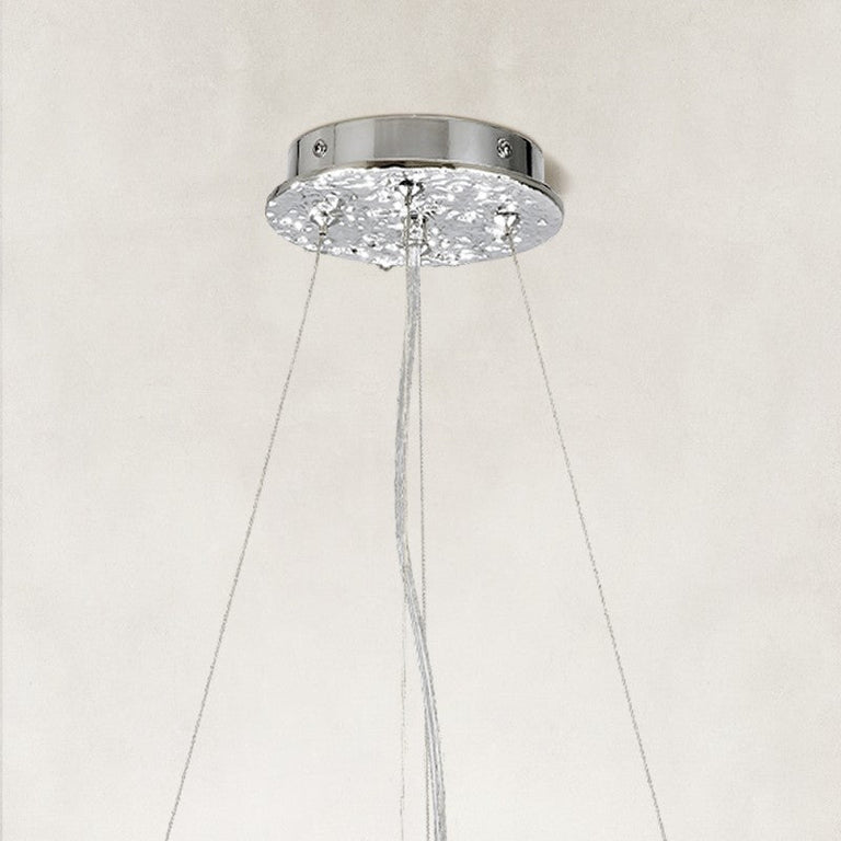Silver-colored chandelier canopy and suspension cables.