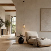 Smoky Four-Panel Marble Pendant displayed in a furnished interior