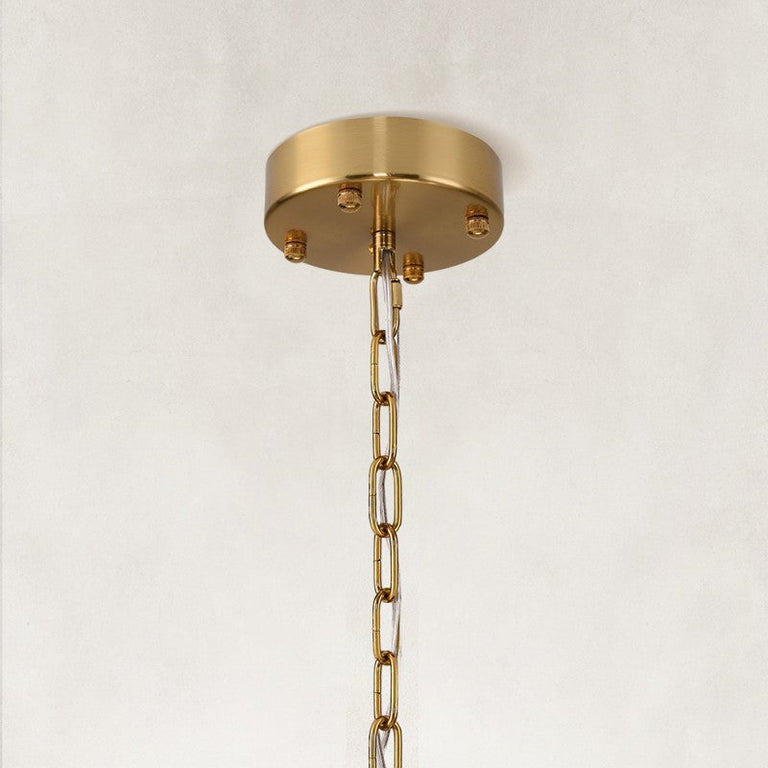 Single-tier panel chandelier, brass-tone canopy and chain.