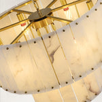 Two-tier panel chandelier, illuminated stone panel and brass-tone frame.