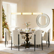 Brass-finish alabaster linear chandelier above a dining table