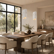 Tapered White Marble Blade Pendant installed above a dining table