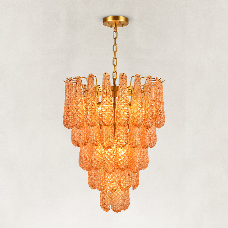 Amber textured glass cascade chandelier with Brass-finish hardware, shown as a complete fixture