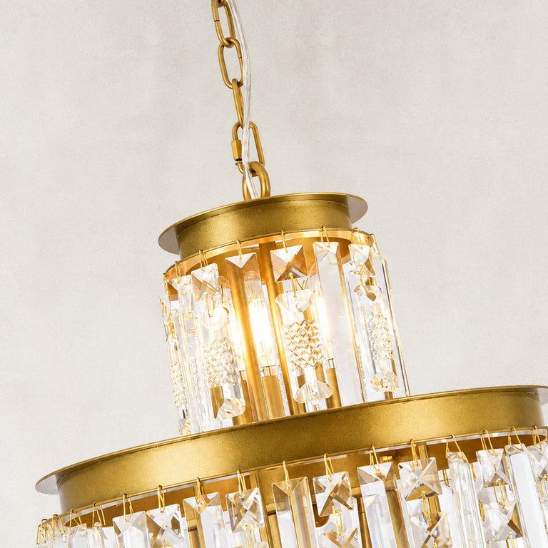 Compact crystal drum chandelier, top cage and upper crystal bars close view.