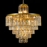 Illuminated gold-tone tiered crystal drum chandelier against a black background.