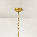 Tiered crystal drum chandelier, stepped ceiling canopy and chain close view.