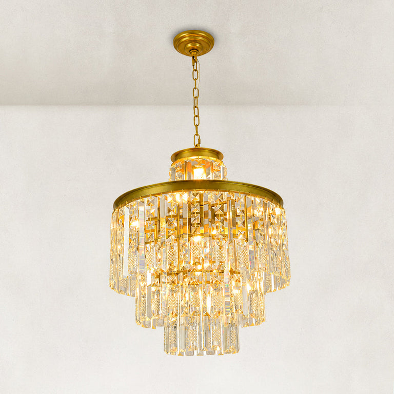 Illuminated crystal drum chandelier, complete angled view with chain.