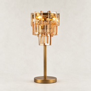 Amber crystal table lamp with Brass-finish hardware, shown as a complete fixture