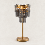 Smoke crystal table lamp with Brass-finish hardware, shown as a complete fixture