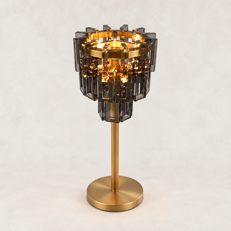 Smoke crystal table lamp with Brass-finish hardware, shown as a complete fixture