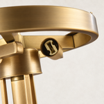 Two-hole lamp holder detail beneath the Brass-finish table lamp frame