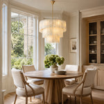 Tiered Marble Drum Pendant installed above a dining table