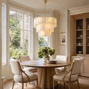 Tiered Marble Drum Pendant installed above a dining table