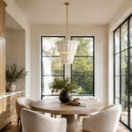 Tiered Tapered Marble Pendant installed above a dining table