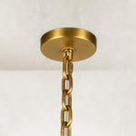 Round canopy of the tiered tubular glass chandelier
