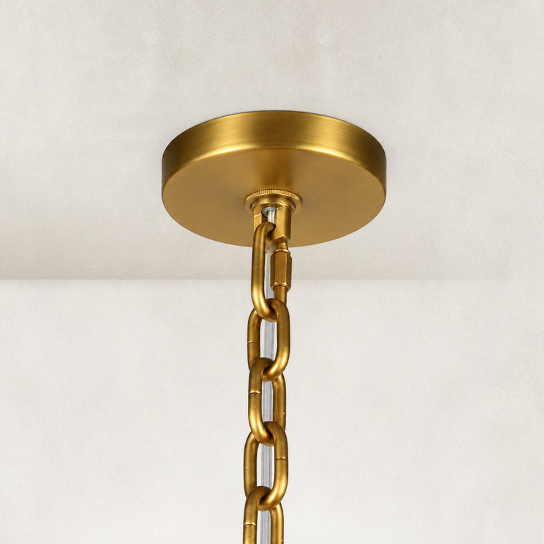 Round canopy of the tiered tubular glass chandelier