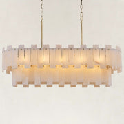 Illuminated brass-finish two-tier alabaster panel chandelier against a neutral background