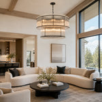 Black two-tier fluted glass chandelier in a room.