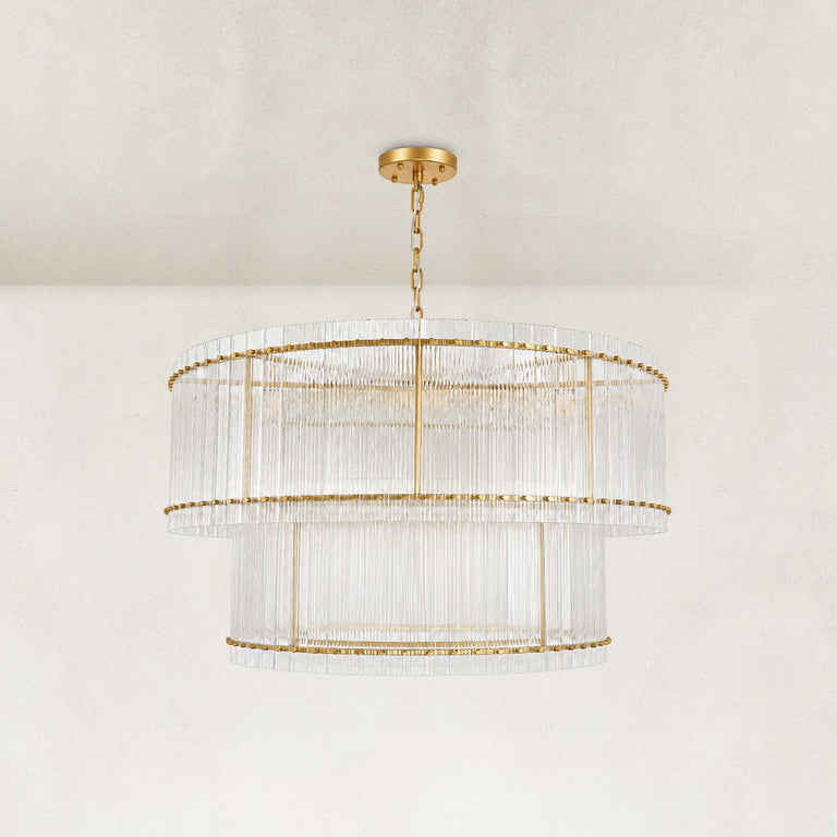 Gold-tone two-tier chandelier with vertical glass rods.