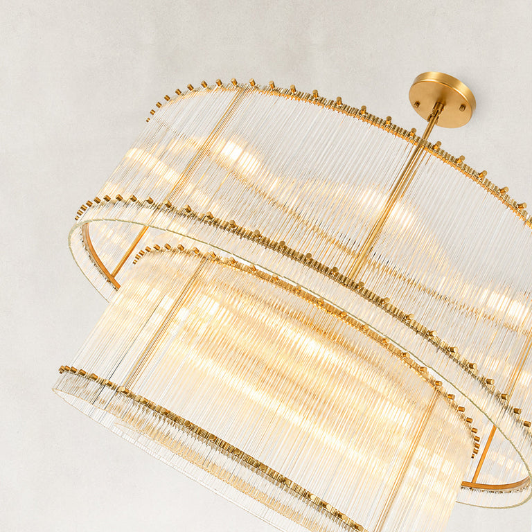 Gold-tone two-tier chandelier with vertical glass rods.