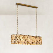 Product detail of Variegated Scalloped Marble Island Pendant against a neutral background
