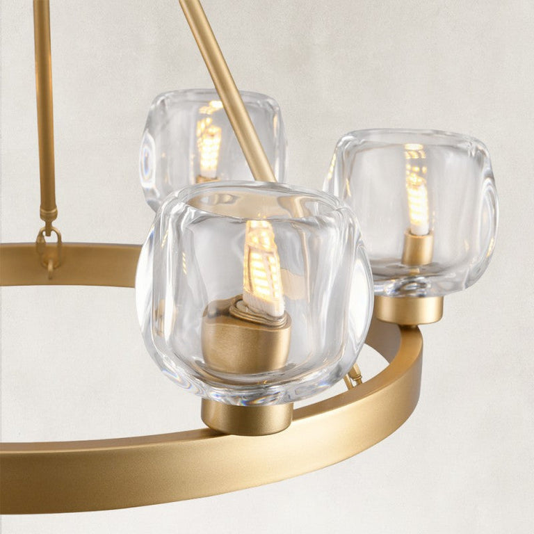 Gold ring chandelier clear rounded shade close-up