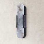 black elongated panel wall sconce unlit.
