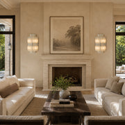 Vertical Layered Marble Wall Sconce displayed in a furnished living room