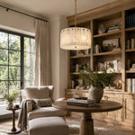 White Marble Drum Pendant displayed in a furnished living room