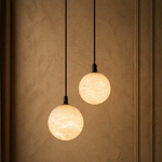 Small Orb Pendant Alabaster by Dalmivik, product or room detail view